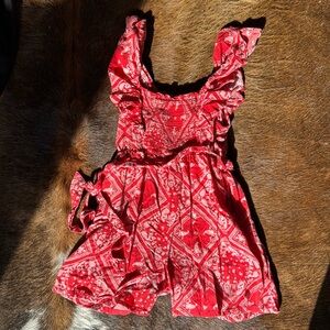 Cute red handkerchief patterned romper. Girls YM